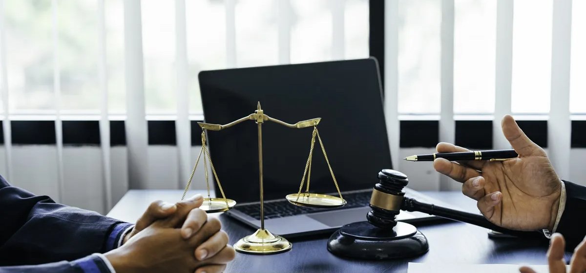 A lawyer talking to a client