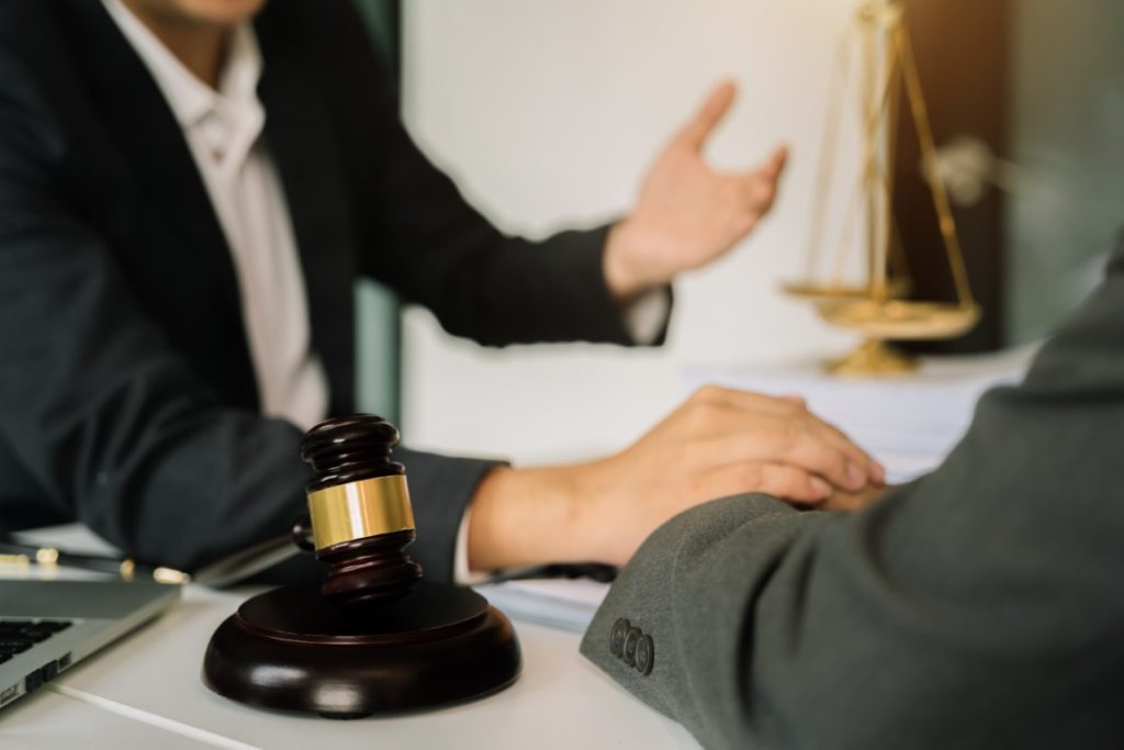 A lawyer providing legal counsel to a client