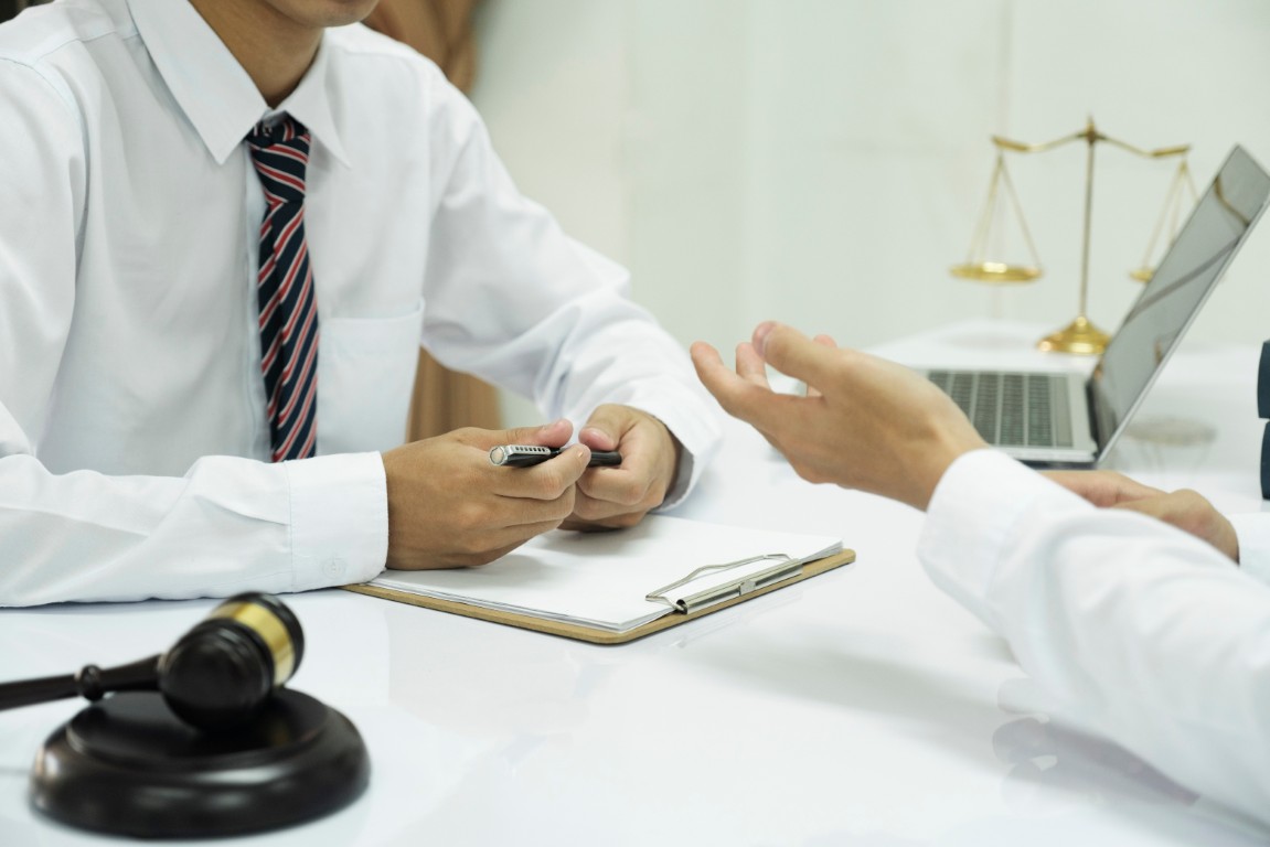 A lawyer providing legal counsel to a client