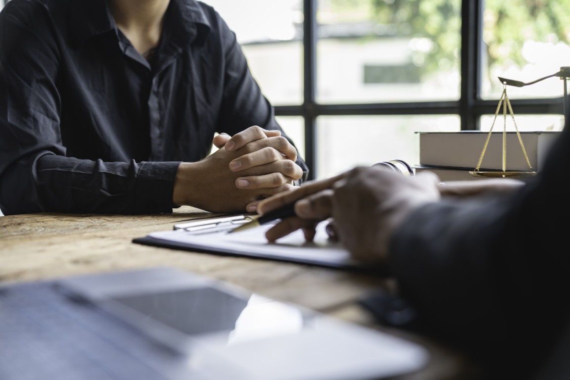 A lawyer providing legal counsel to a client