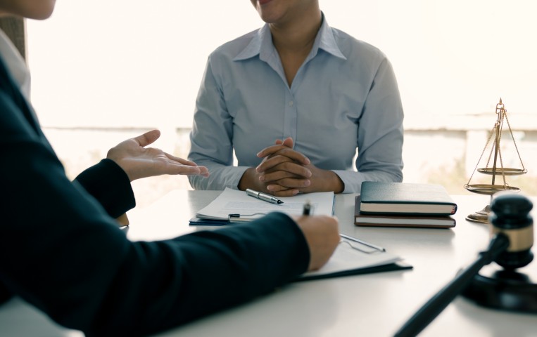 A lawyer providing counsel to a client