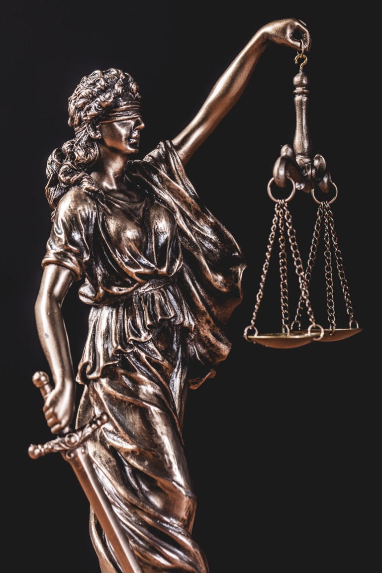 A statuette of Lady Justice
