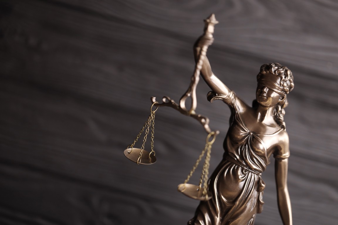 A statuette of Lady Justice